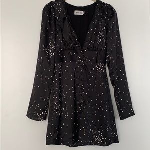 Black mini dress with white polka dots